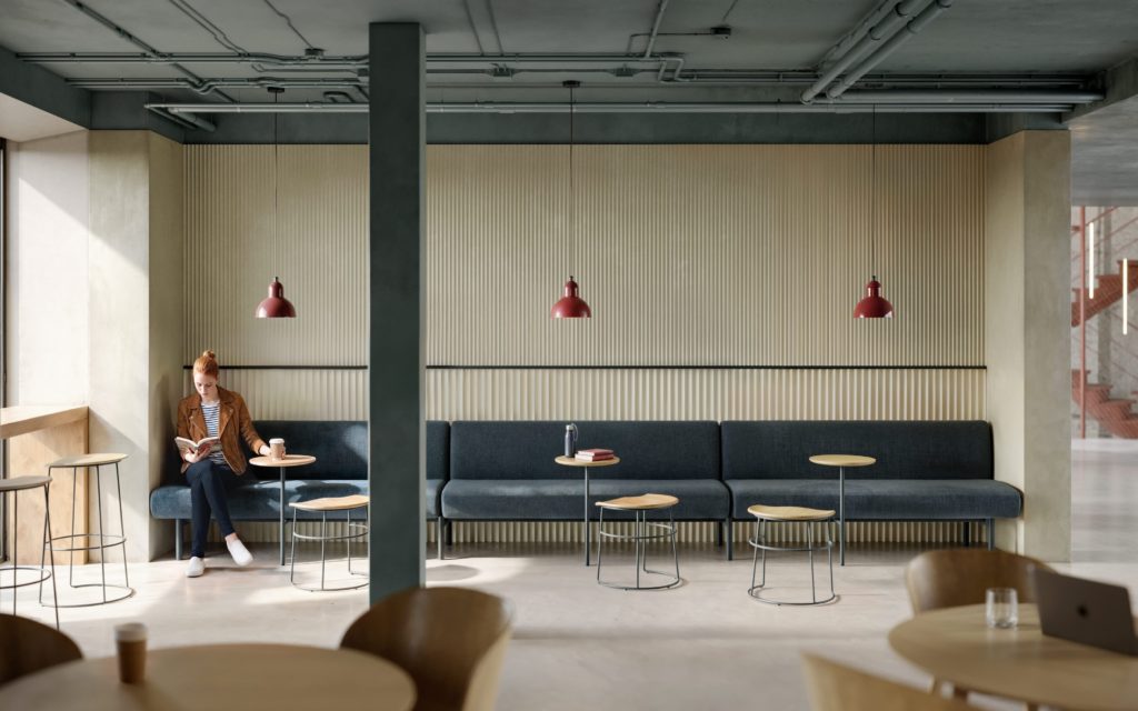 Cafe benching system, paired with tablet arm tables and Baraga stools.